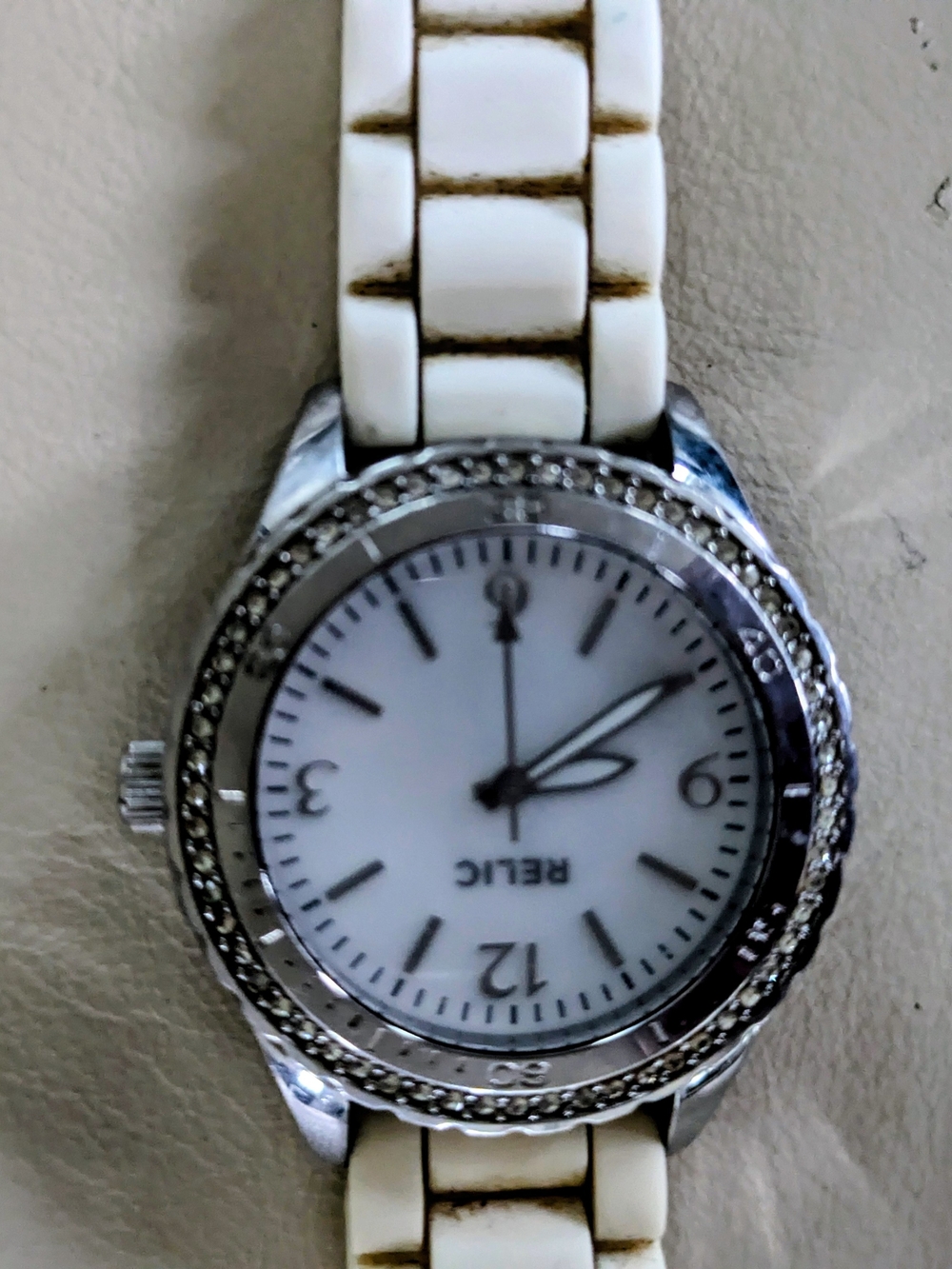 Relic Women’s White and Silver Ceramic-Link Crystal Bezel Watch